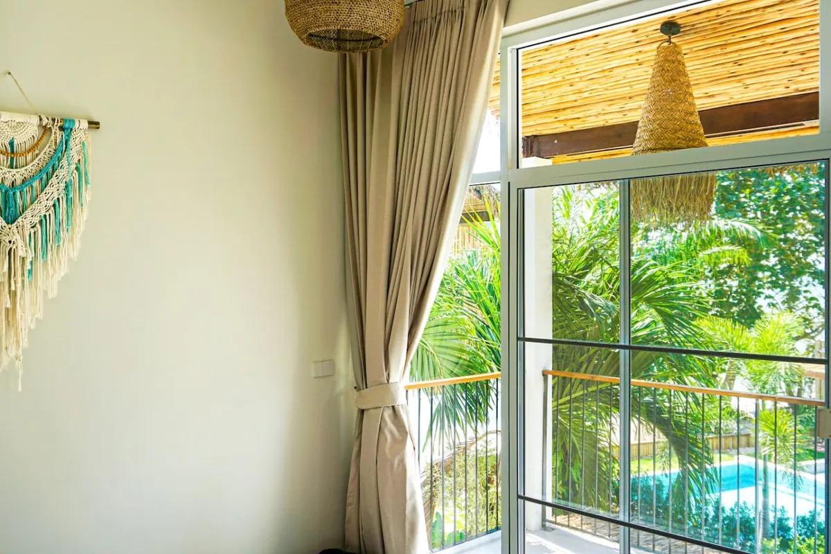 Baan Tai Cozy Beachfront House, Baan Tai — garden view from a bedroom — Crazy GAKKO Stay