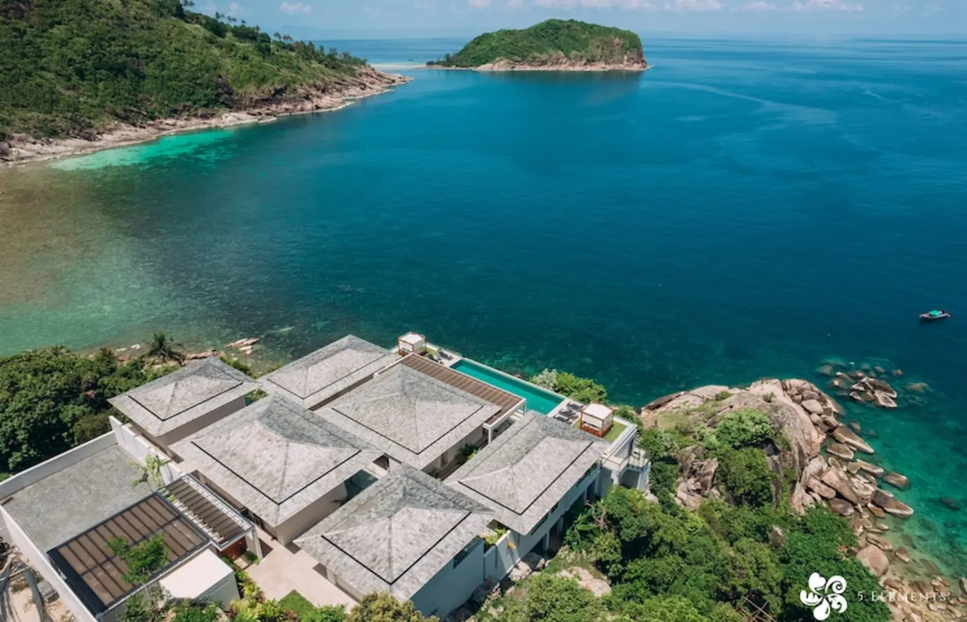 Bay Villas cascading above Salad Bay — Crazy GAKKO Stay