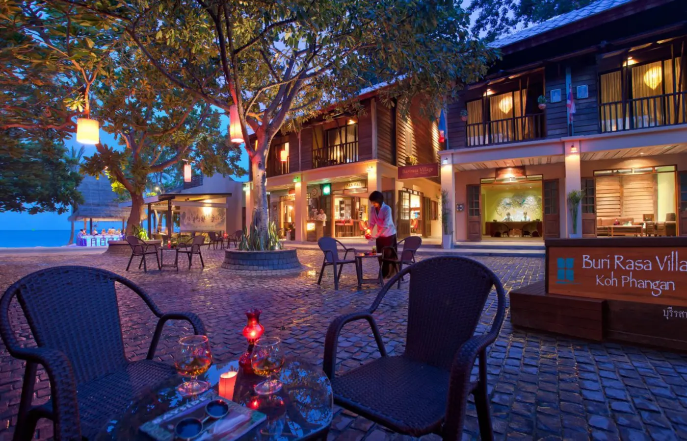 Lantern-lit village square at Buri Rasa Village Phangan — Crazy GAKKO Stay