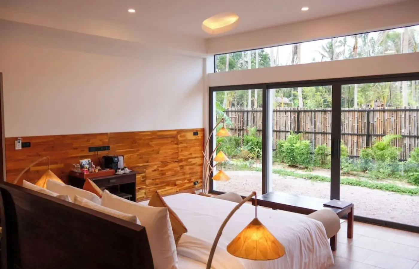Bedroom opening to a pool at Chaloklum Residences — Crazy GAKKO Stay