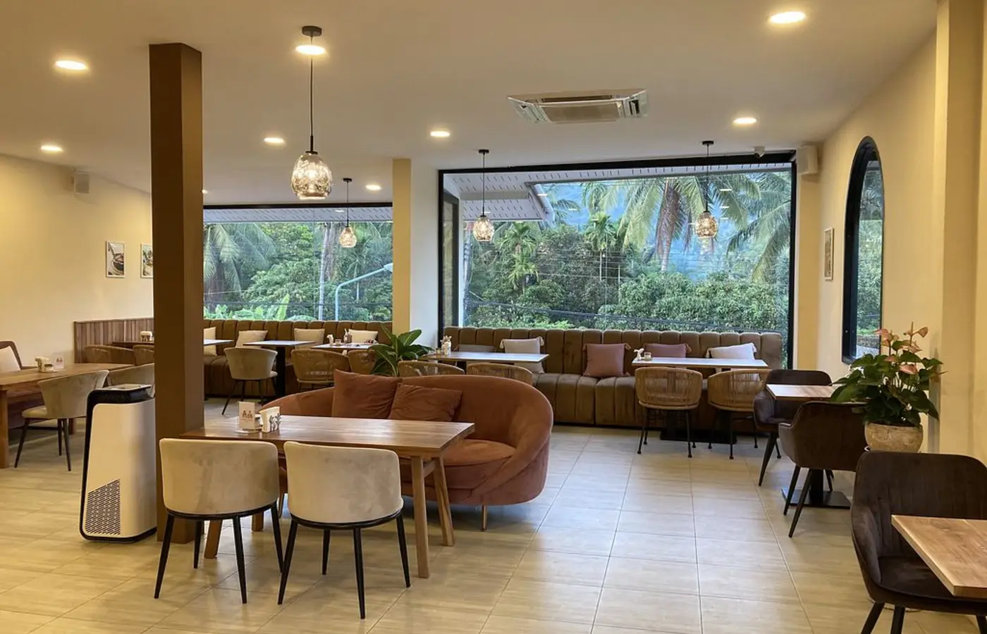 Comfortable interior and tropical windows at Deli Devi Koh Phangan
