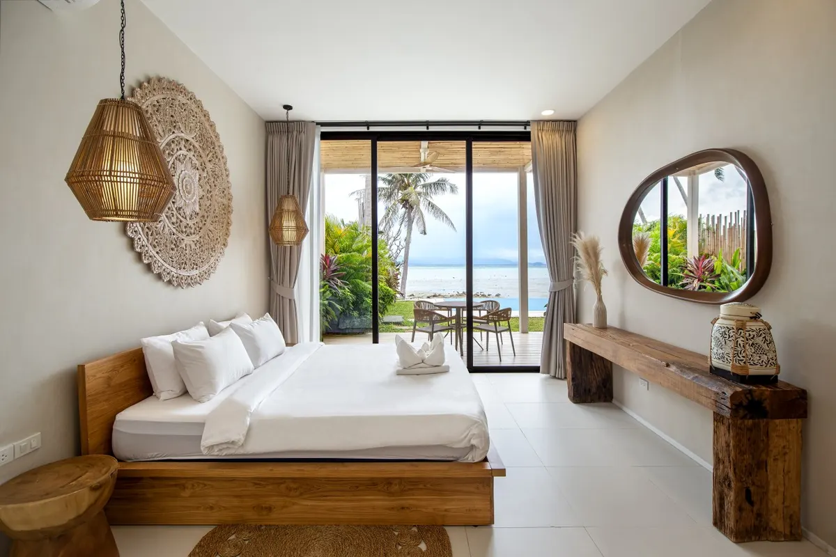 Hin Kong 5BR Beachfront Villa, Hin Kong — bedroom with sea-facing doors — Crazy GAKKO Stay