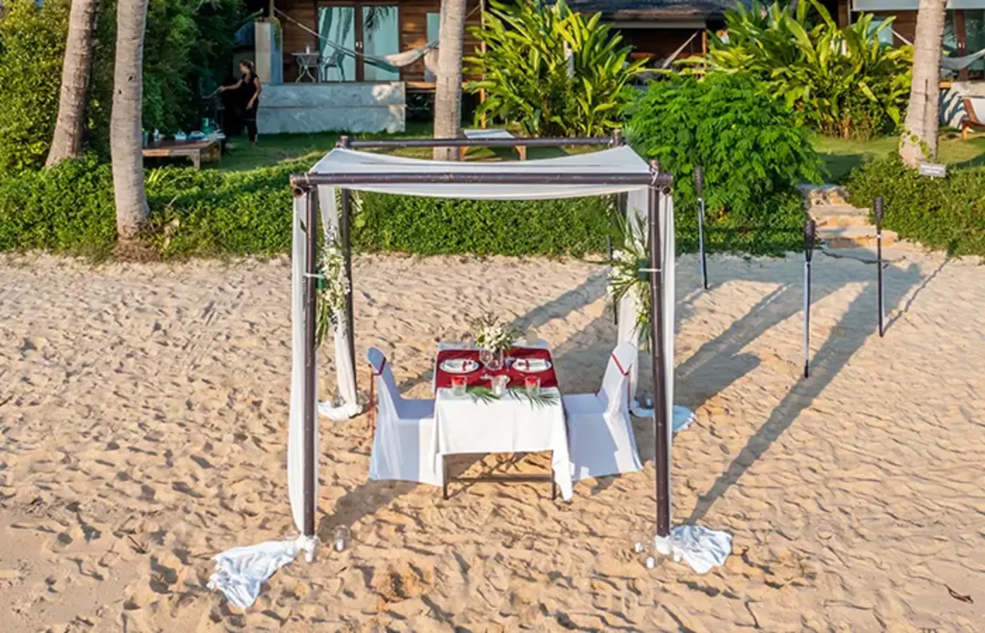 Private beachfront lounging area at Nibbana Bungalows — Crazy GAKKO Stay