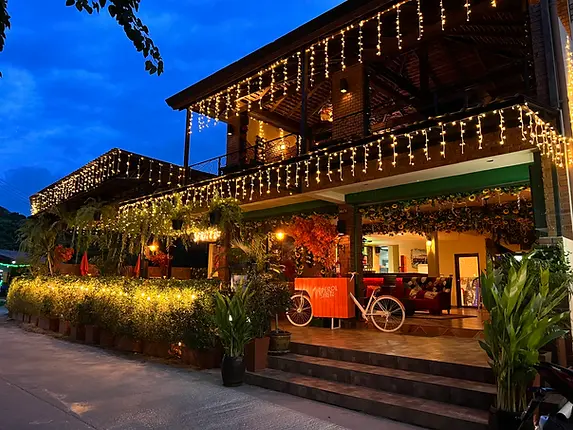 Valentino Restaurant and Wine Bar glowing at dusk in Koh Phangan